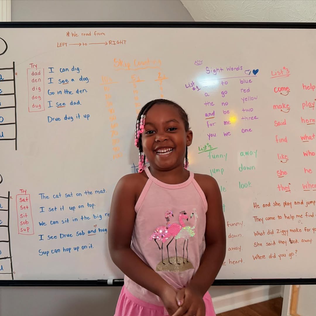 A child at a whiteboard